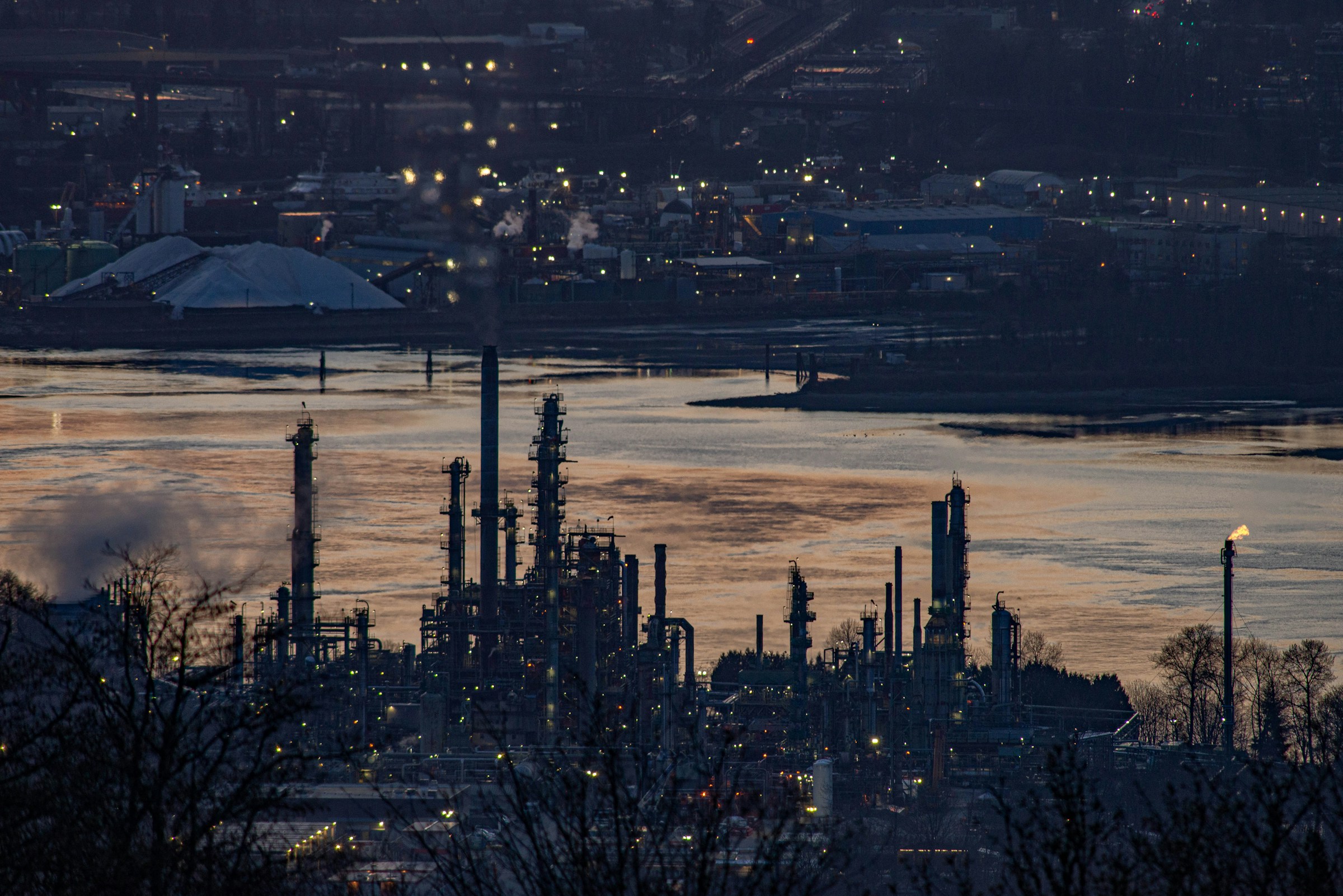 Industrial processing facility with pipework and towers